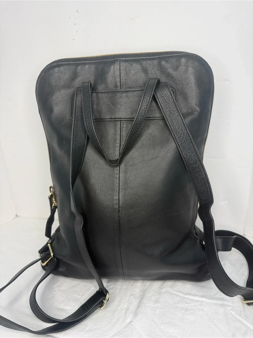 Black Leather Men’s Backpack with Gold Hardware